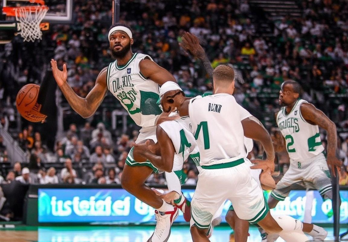 波士顿凯尔特人三分雨浇灭热火，怀特布朗合砍63分助球队稳固东部头名